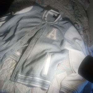 Grey and white button up jacket